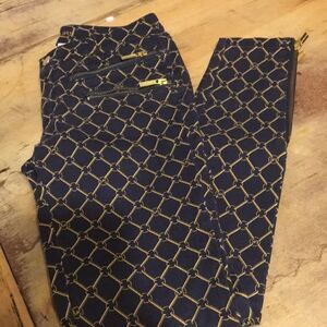 Michael Kors gold chain skinny jeans